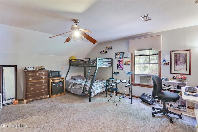 bedroom featuring cooling unit, carpet flooring, vaulted ceiling, and ceiling fan