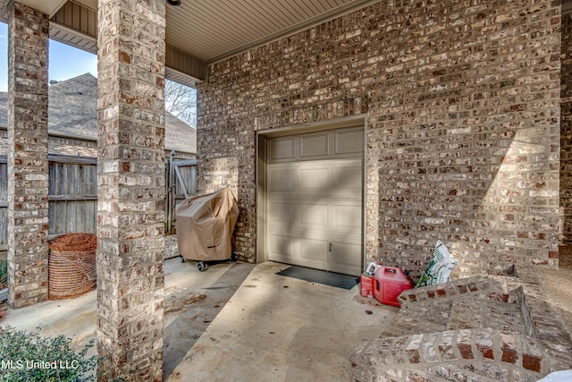 property entrance with brick siding