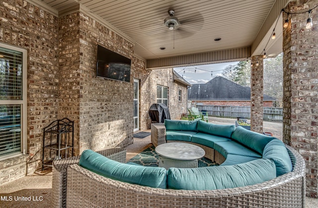 view of patio with fence and an outdoor living space