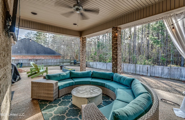 view of patio / terrace featuring an outdoor hangout area, ceiling fan, and a fenced backyard