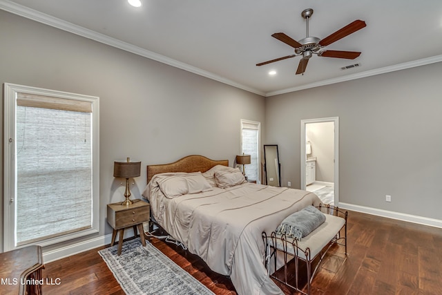 bedroom featuring crown molding, wood-type flooring, visible vents, and baseboards