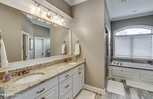 bathroom with double vanity, a garden tub, crown molding, and a sink