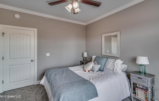 carpeted bedroom featuring ceiling fan and ornamental molding