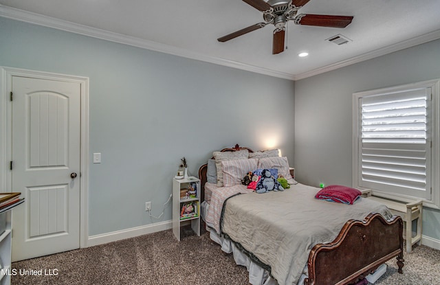 bedroom with carpet floors, a ceiling fan, visible vents, baseboards, and ornamental molding