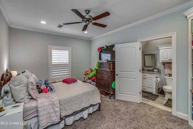 bedroom featuring recessed lighting, visible vents, ornamental molding, light carpet, and connected bathroom