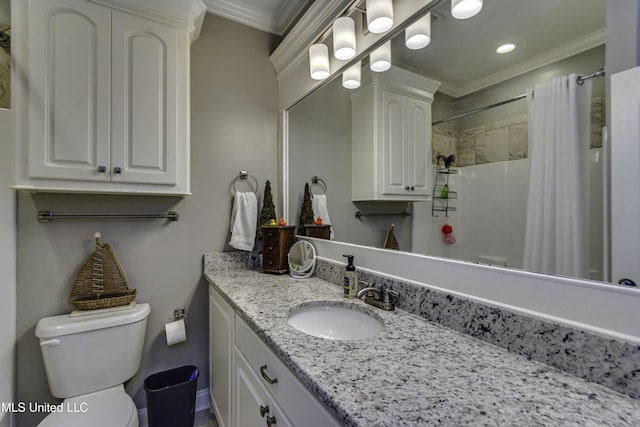 full bathroom featuring toilet, ornamental molding, a shower with shower curtain, and vanity