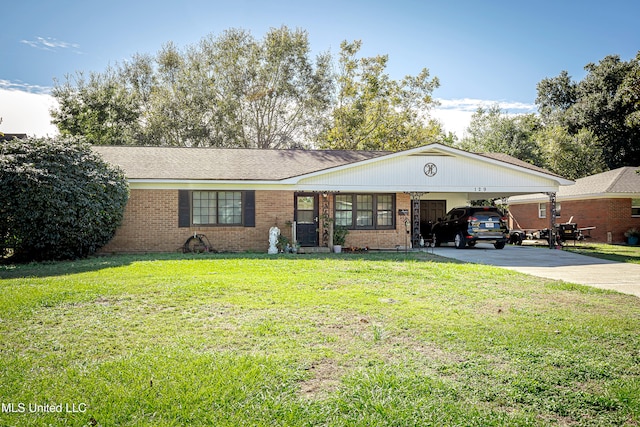 ranch-style home with a carport and a front yard