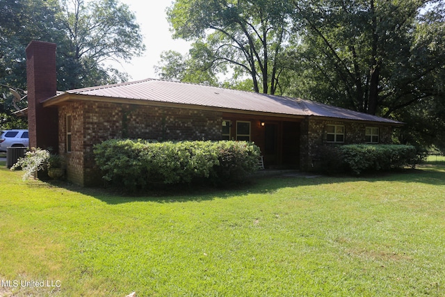 exterior space with a lawn