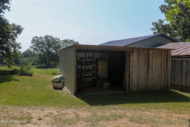 view of outdoor structure with a yard