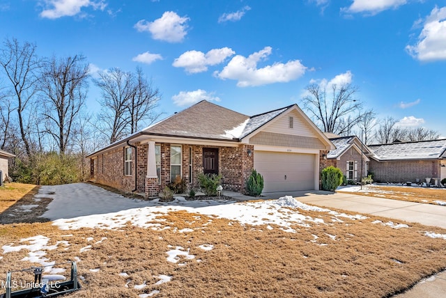 ranch-style home featuring a garage