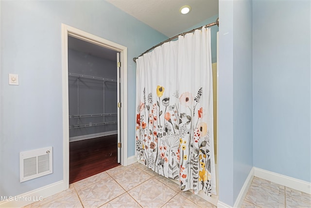 bathroom featuring tile patterned floors