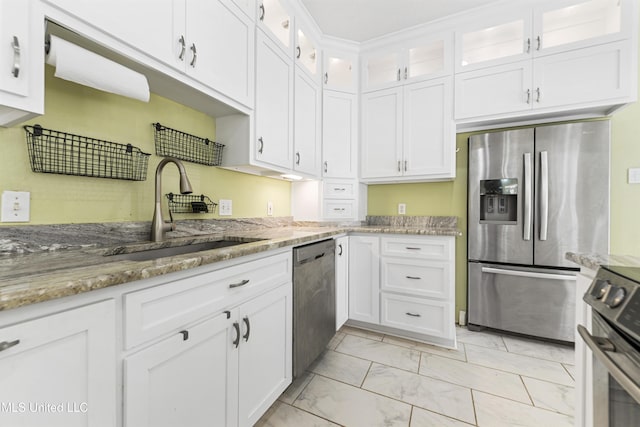 kitchen with sink, dishwasher, stainless steel fridge with ice dispenser, and white cabinets