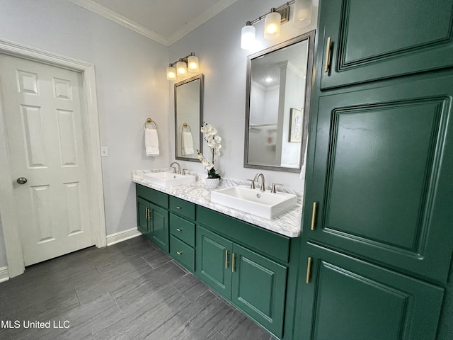 bathroom with vanity and crown molding