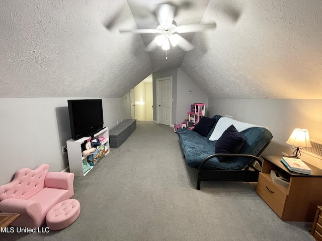 interior space with lofted ceiling, light colored carpet, and a textured ceiling