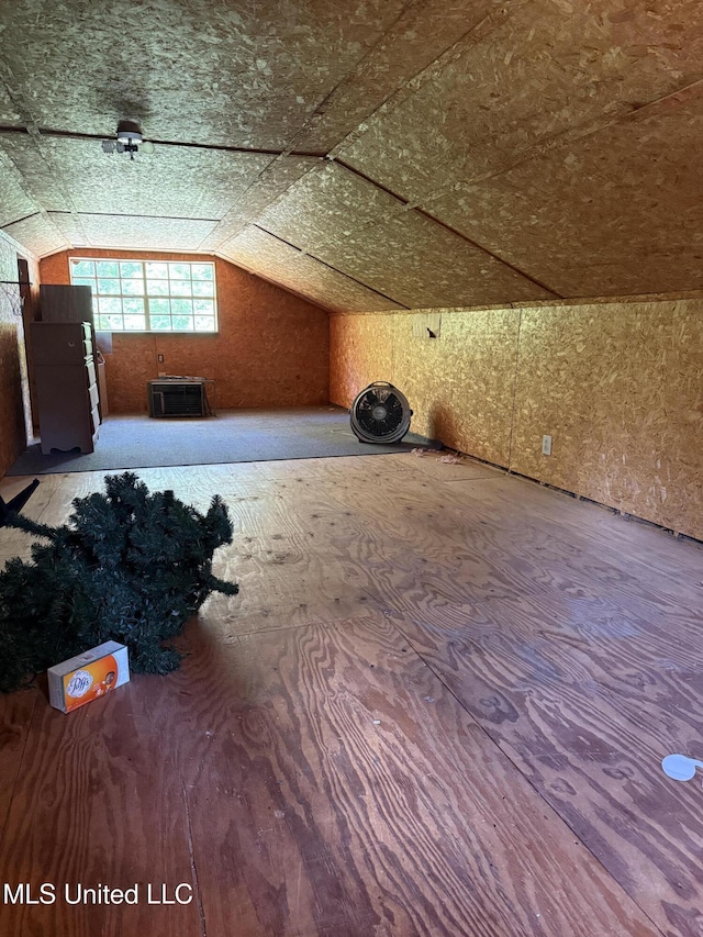 additional living space with lofted ceiling