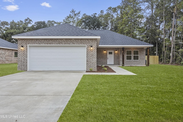 single story home with a front lawn and a garage