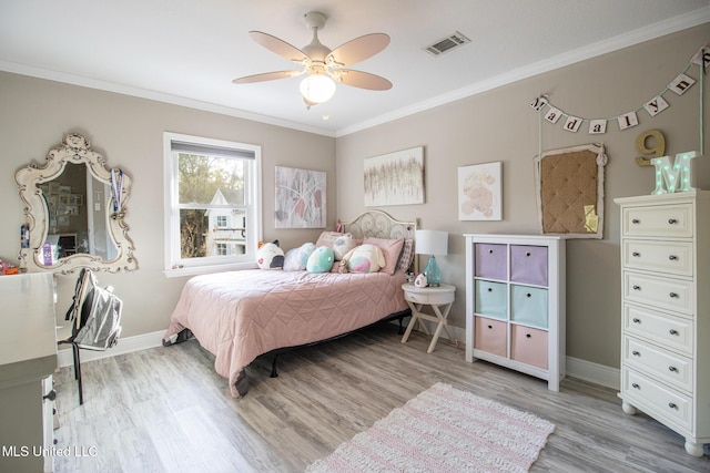 bedroom with ceiling fan, light hardwood / wood-style floors, and ornamental molding