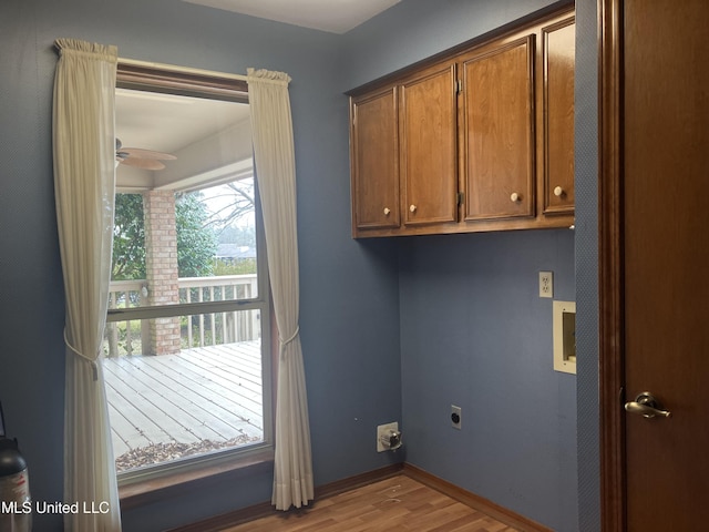 washroom with light hardwood / wood-style flooring, hookup for an electric dryer, and ceiling fan