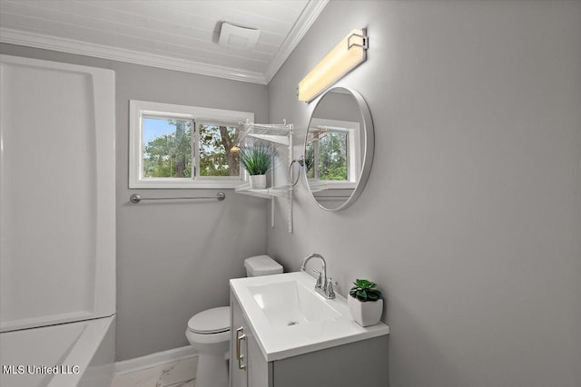 bathroom featuring vanity, toilet, and crown molding