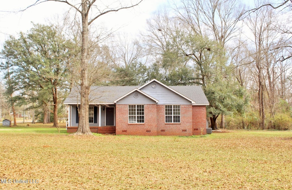 ranch-style house with a front yard