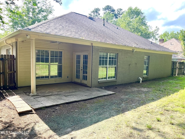 231 Clark Farms Rd, Madison, MS 39110 - rear view of house with french doors, a shingled roof, a patio area, and brick siding