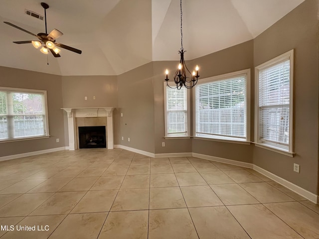 7309 Gerralyn Cv, Olive Branch, MS 38654 - unfurnished living room with light tile patterned floors, ceiling fan, a fireplace, a chandelier, and high vaulted ceiling