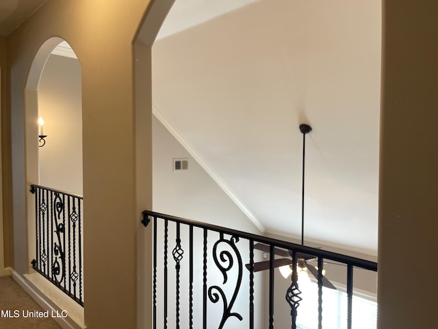 7309 Gerralyn Cv, Olive Branch, MS 38654 - hallway with arched walkways and carpet floors