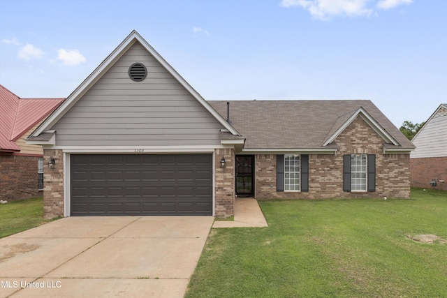 7306 George Ln, Horn Lake, MS 38637 - view of front facade featuring brick siding, a front lawn, concrete driveway, an attached garage, and roof with shingles