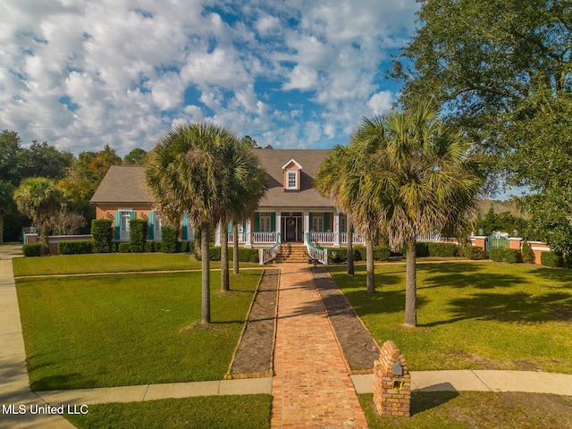 view of front facade with a porch and a front lawn