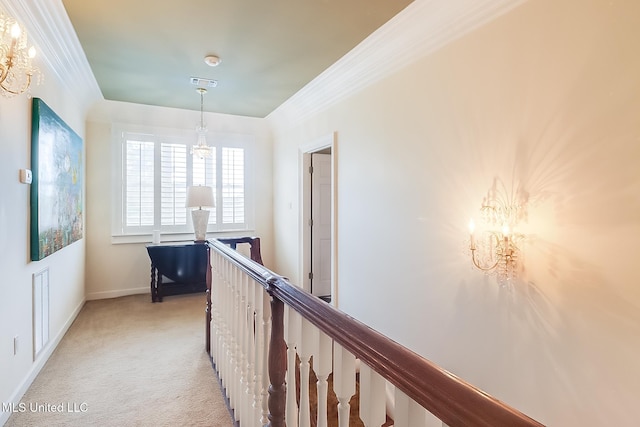 hallway featuring light colored carpet and a chandelier