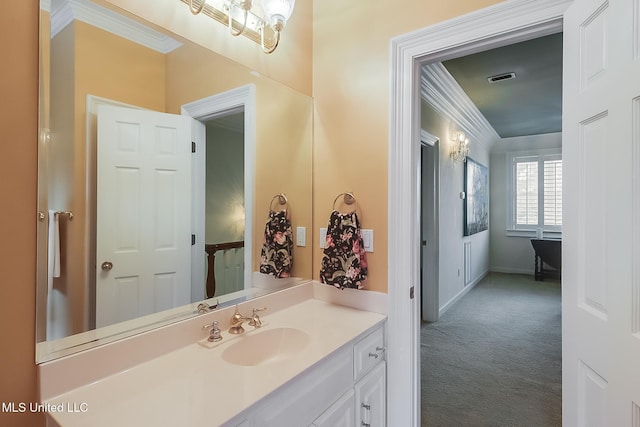 bathroom featuring vanity and crown molding