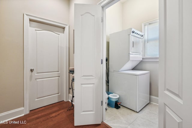 30 Oak Alley Ln, Long Beach, MS 39560 - laundry area featuring stacked washer / drying machine and wood finished floors