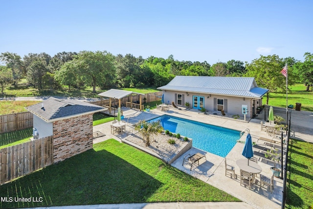 30 Oak Alley Ln, Long Beach, MS 39560 - view of pool with a fenced backyard, a patio area, and french doors
