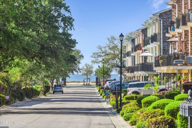 30 Oak Alley Ln, Long Beach, MS 39560 - view of asphalt road featuring street lighting and a water view