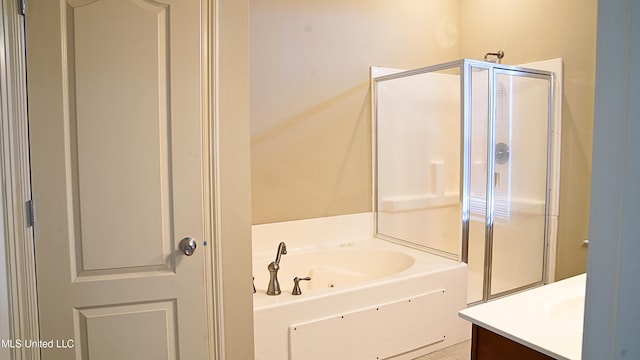 30 Oak Alley Ln, Long Beach, MS 39560 - bathroom featuring vanity, a tub with jets, and a stall shower