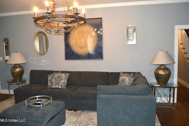 living room featuring wood-type flooring, crown molding, and a chandelier