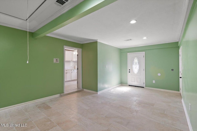 entrance foyer featuring ornamental molding