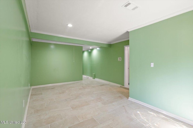 unfurnished room featuring ornamental molding