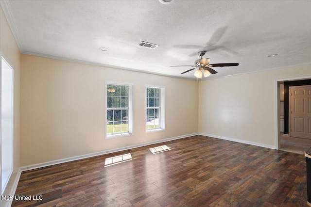 unfurnished room featuring ceiling fan, crown molding, a textured ceiling, and dark hardwood / wood-style floors