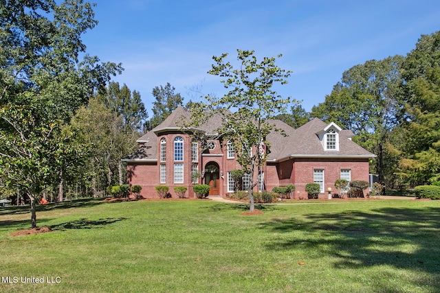 view of front of home with a front yard