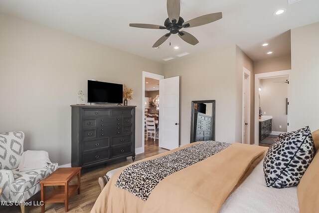 118 Sea Oaks Blvd, Long Beach, MS 39560 - bedroom with recessed lighting, wood finished floors, baseboards, a ceiling fan, and ensuite bathroom