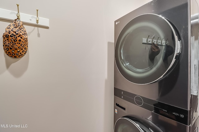 118 Sea Oaks Blvd, Long Beach, MS 39560 - laundry area with stacked washer / drying machine