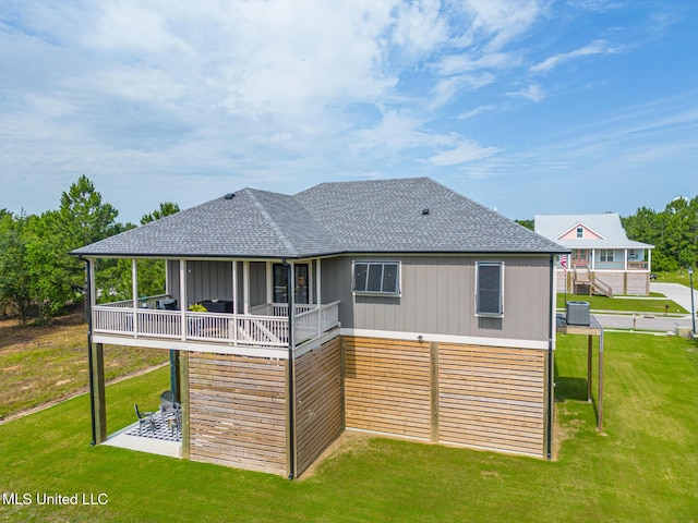 118 Sea Oaks Blvd, Long Beach, MS 39560 - rear view of property with roof with shingles, cooling unit, a lawn, and a patio area