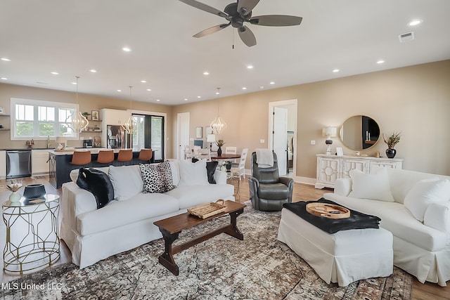 118 Sea Oaks Blvd, Long Beach, MS 39560 - living area with recessed lighting, light wood-style flooring, ceiling fan, and baseboards