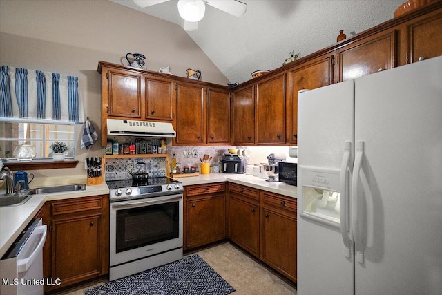 147 Lofty Pine Ln, Clinton, MS 39056 - kitchen with white appliances, range hood, lofted ceiling, light countertops, and a sink