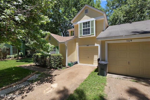 147 Lofty Pine Ln, Clinton, MS 39056 - traditional-style home featuring concrete driveway, a shingled roof, and a front yard