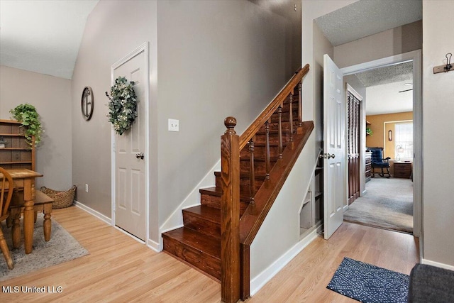 147 Lofty Pine Ln, Clinton, MS 39056 - staircase featuring wood finished floors and baseboards