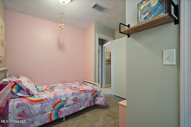 147 Lofty Pine Ln, Clinton, MS 39056 - carpeted bedroom with a textured ceiling