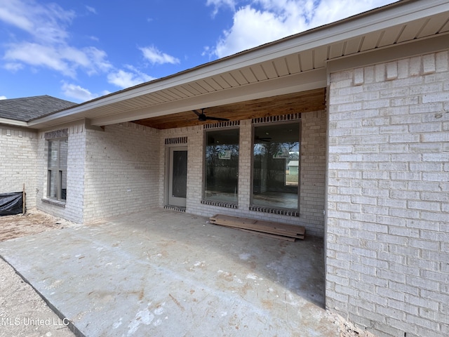 view of patio with ceiling fan