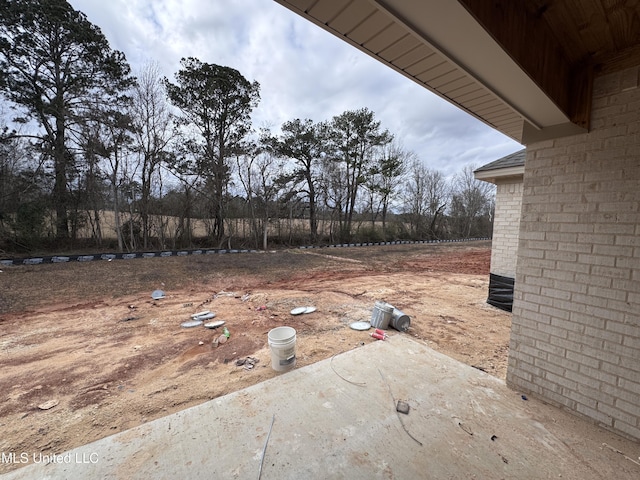 view of yard with a patio area